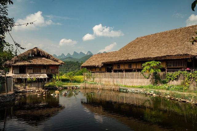 pong-with-wooden-village-building-near-it-blue-sky